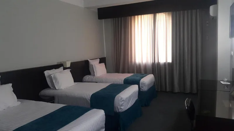 Numidien Hotel, Alger — Chambre Triple
